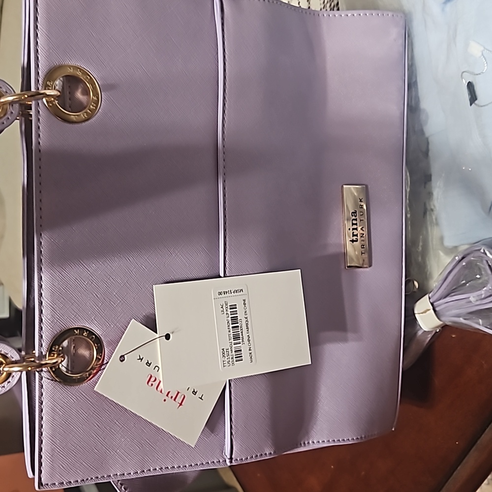 TRINA Turk purple hand bag,nwt